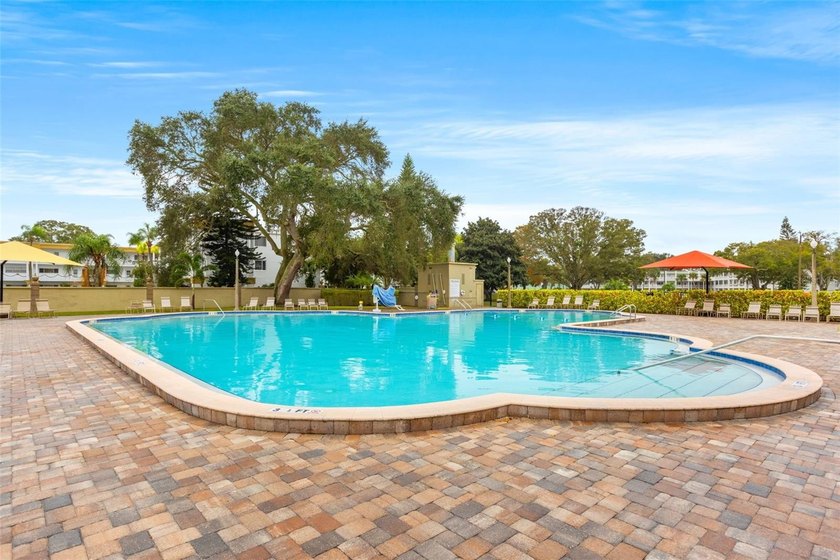 Wake up to peaceful views of a sparkling fountain pond from this - photo 20