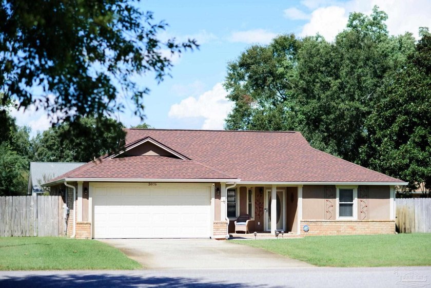 Escape to paradise in this beautifully updated home located in - photo 2