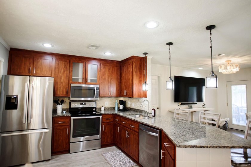 Escape to paradise in this beautifully updated home located in - photo 4