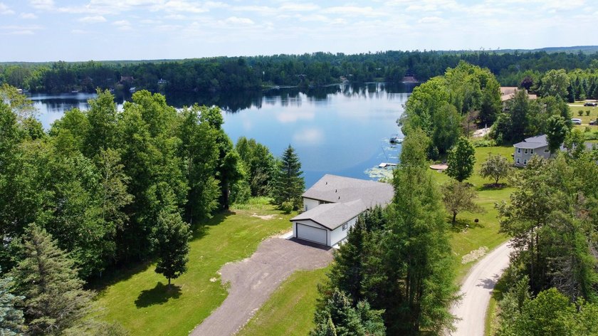 Welcome to lake life on beautiful Big Twin Lake! This - photo 47