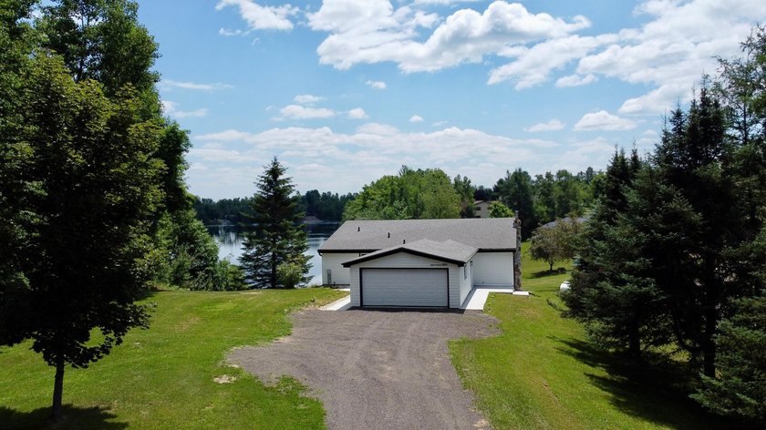Welcome to lake life on beautiful Big Twin Lake! This - photo 48