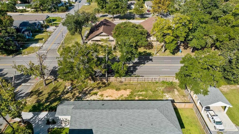 This versitile, perfectly-located lot is zoned R-2. This allows - photo 6