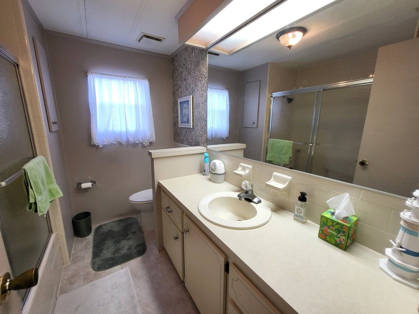 BRAND NEW HVAC SYSTEM 2026! Just listed in Camelot Lakes. Fully - photo 27
