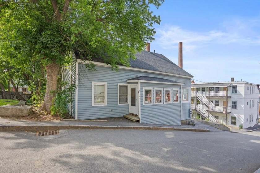 This updated duplex offers a solid opportunity for both - photo 2