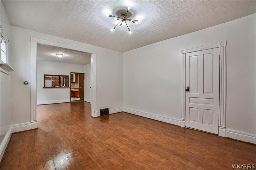 Welcome to this spacious and fully updated 2-family home - photo 7