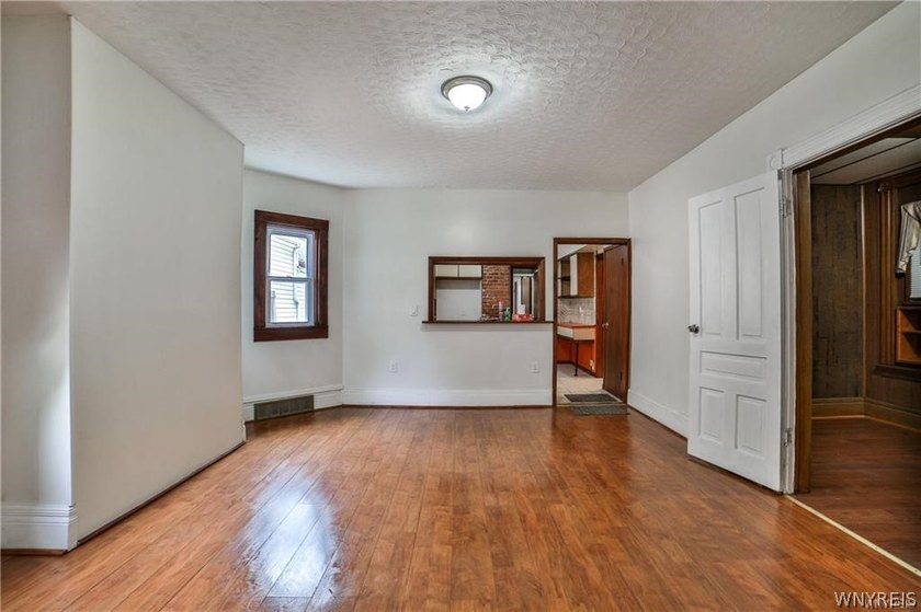 Welcome to this spacious and fully updated 2-family home - photo 9