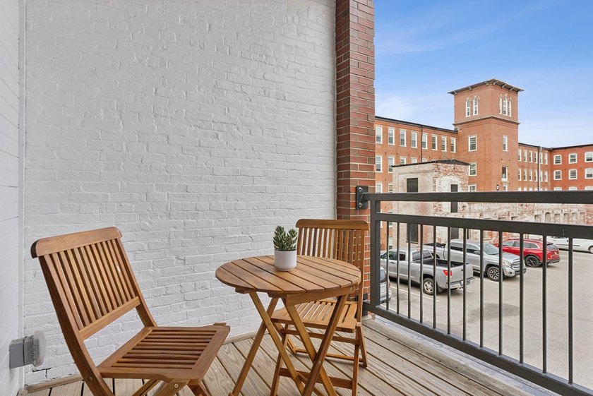 A fantastic two-bedroom, two-bath condo featuring a sun-filled - photo 2