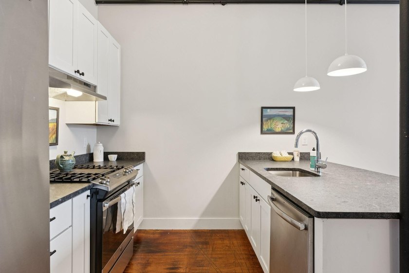 A fantastic two-bedroom, two-bath condo featuring a sun-filled - photo 6