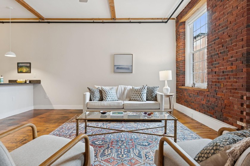 A fantastic two-bedroom, two-bath condo featuring a sun-filled - photo 7