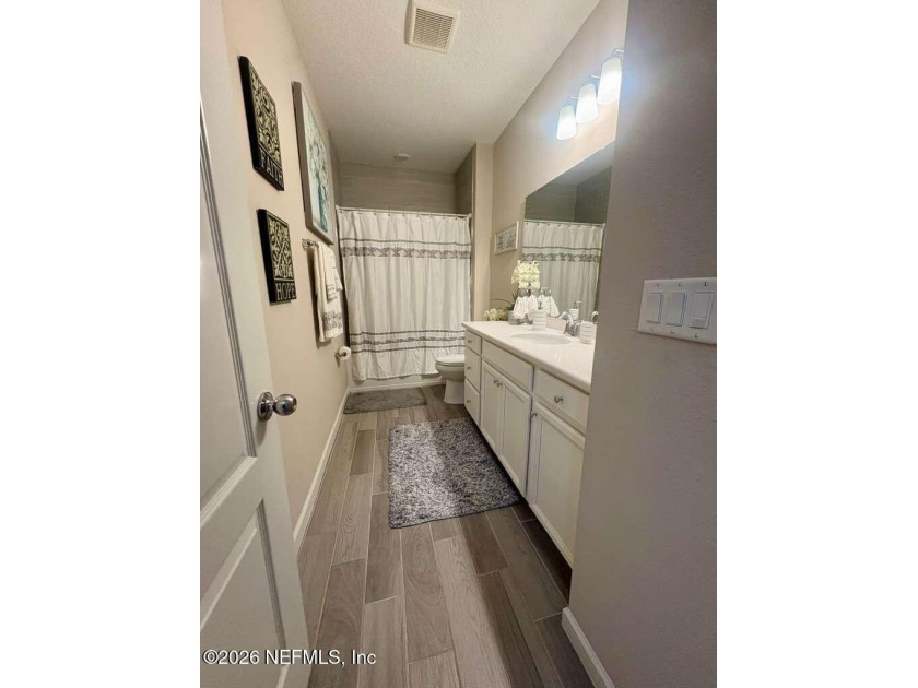 Located in a quiet area of Jacksonville, this property at 9723 - photo 12