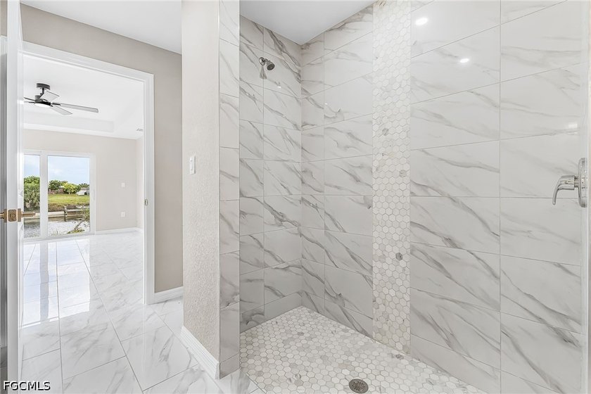 There's a quiet confidence about this home-the kind you feel the - photo 12