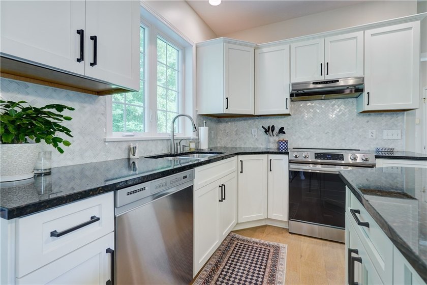 Welcome home to this beautifully updated Colonial, ideally - photo 14