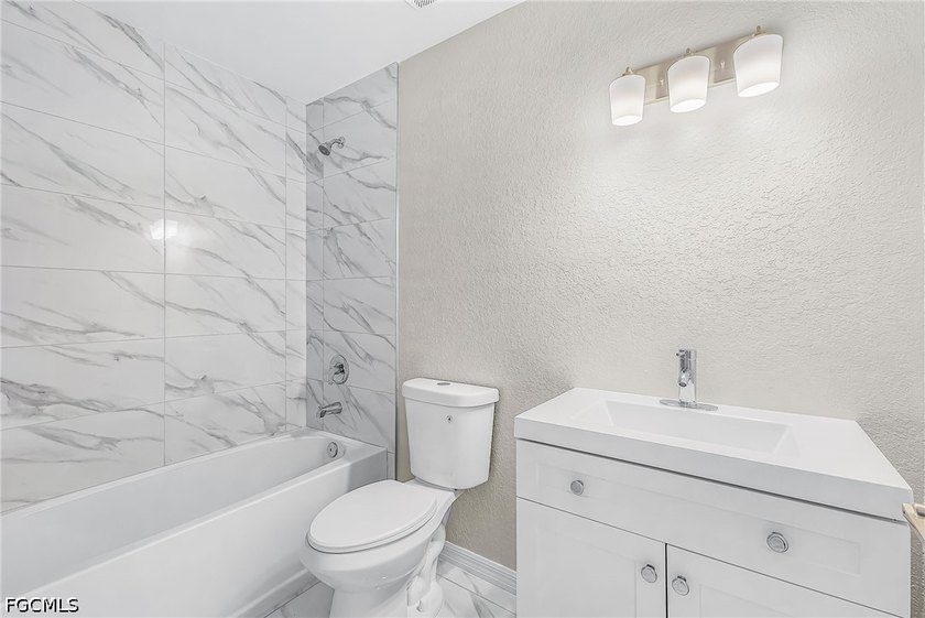 There's a quiet confidence about this home-the kind you feel the - photo 14