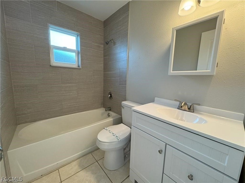 This well-maintained and thoughtfully updated duplex can be - photo 19