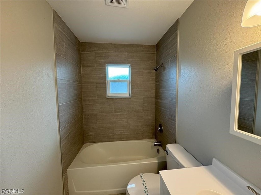 This well-maintained and thoughtfully updated duplex can be - photo 20