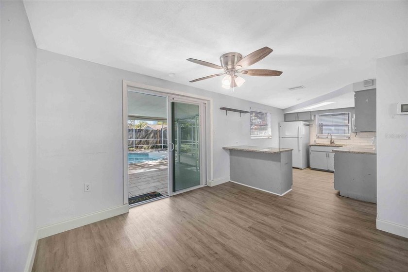 Welcome to 9040 Lunar Lane, Port Richey. A 3-bedroom, 3-bathroom - photo 5