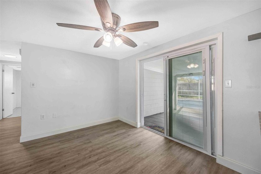 Welcome to 9040 Lunar Lane, Port Richey. A 3-bedroom, 3-bathroom - photo 7