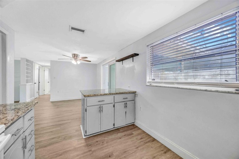 Welcome to 9040 Lunar Lane, Port Richey. A 3-bedroom, 3-bathroom - photo 8