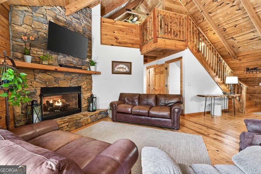 Fully furnished true log home on 5.78 private wooded acres in - photo 4