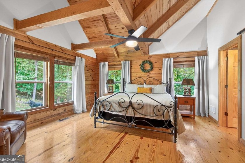 Fully furnished true log home on 5.78 private wooded acres in - photo 5