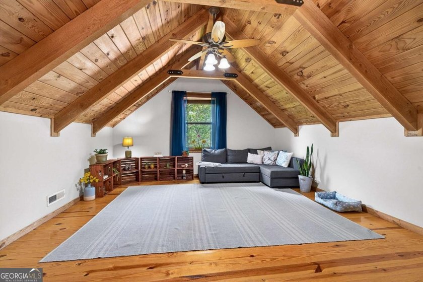 Fully furnished true log home on 5.78 private wooded acres in - photo 10