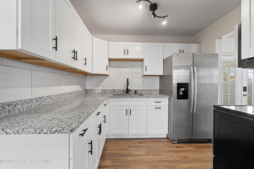 Move-in ready 2-bedroom, 1.5-bath home featuring a beautifully - photo 8