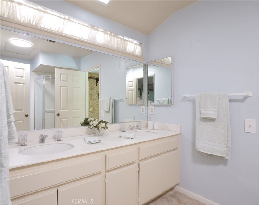 Situated on a quiet street overlooking a lush greenbelt in the - photo 27
