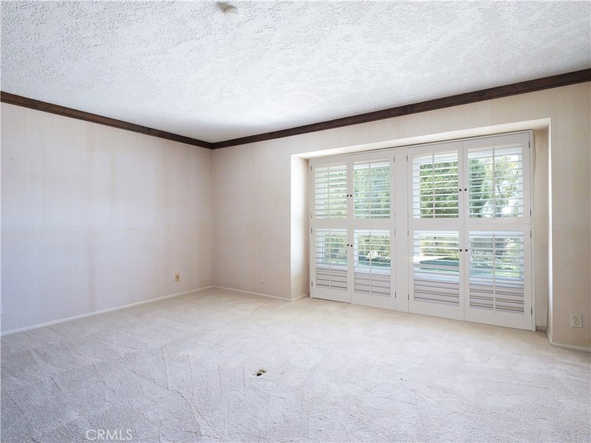 Situated on a quiet street overlooking a lush greenbelt in the - photo 29