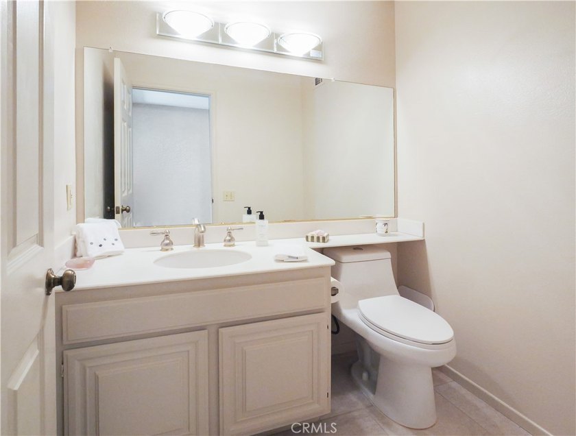 Situated on a quiet street overlooking a lush greenbelt in the - photo 35