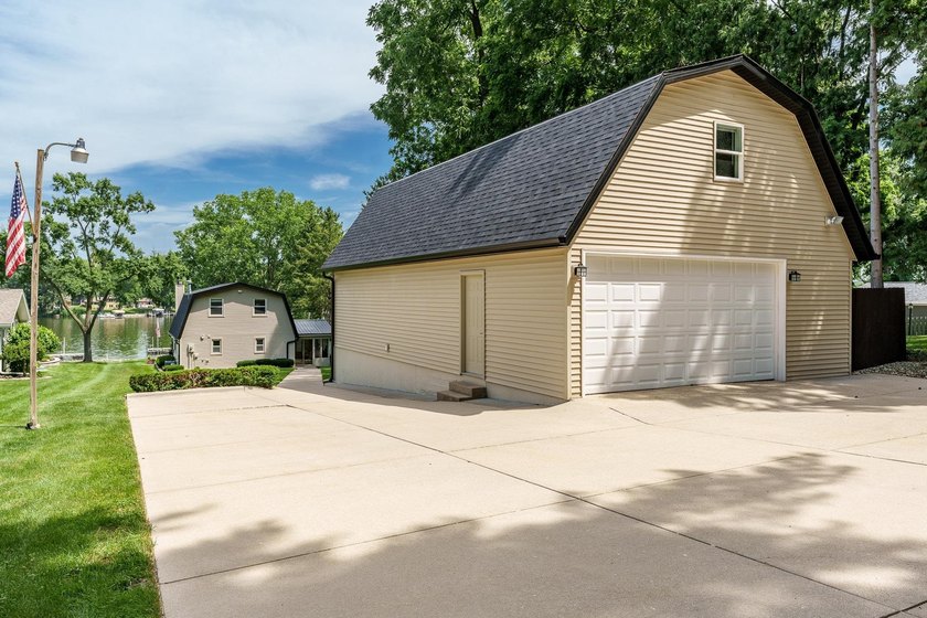 Stunning waterfront property offering 60' of shoreline and every - photo 47