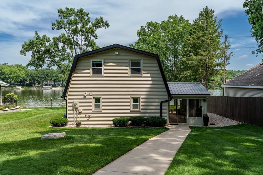 Stunning waterfront property offering 60' of shoreline and every - photo 49