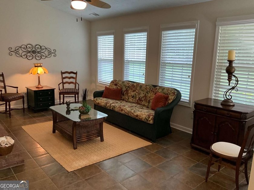 Welcoming large ranch home with 3 car garage in well established - photo 7