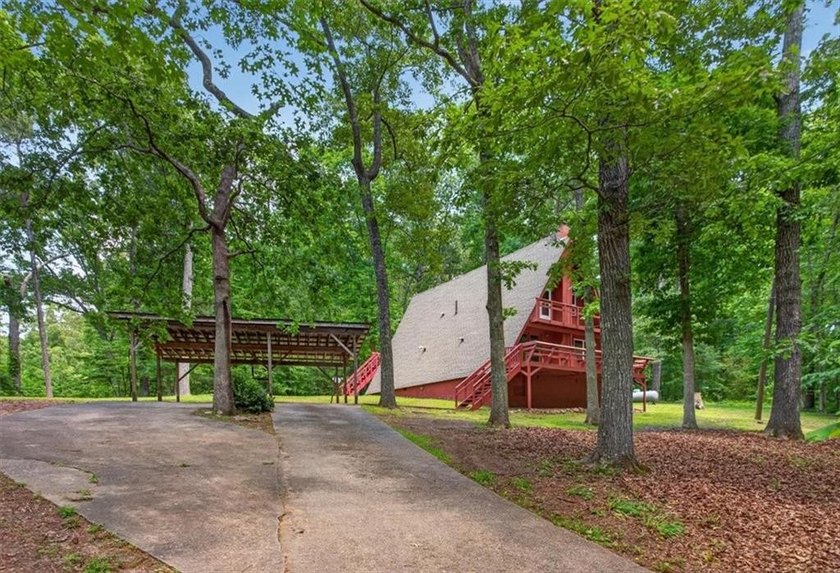 Tucked away on 2.5 beautiful usable acres, 421 Lusk Court offers - photo 3