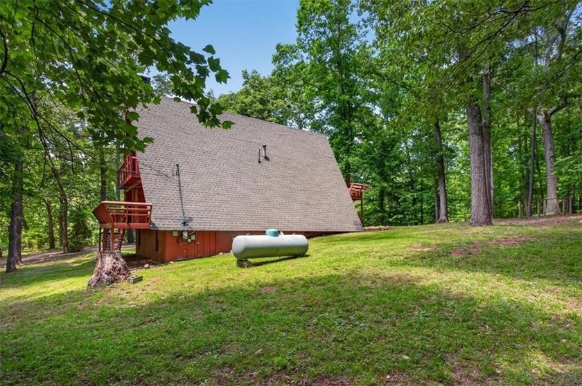 Tucked away on 2.5 beautiful usable acres, 421 Lusk Court offers - photo 4