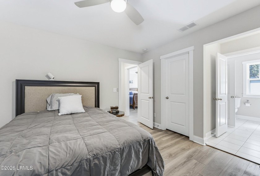 Beautifully set on a private, wooded lot in the sought-after - photo 30