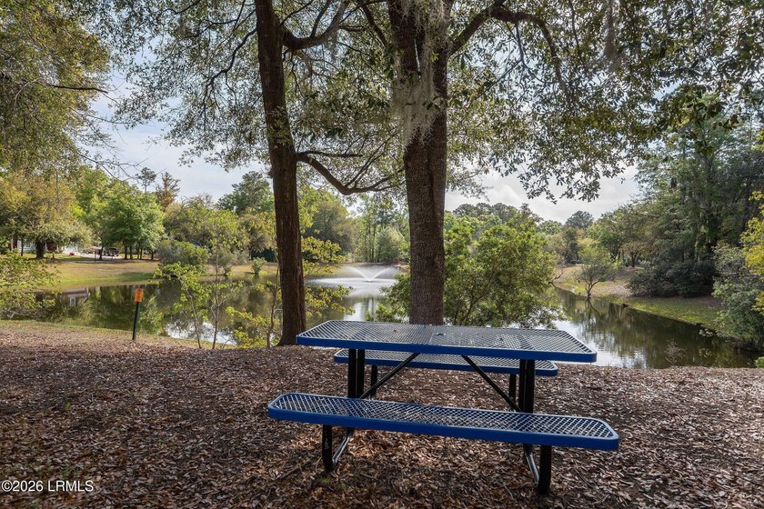 Beautifully set on a private, wooded lot in the sought-after - photo 44