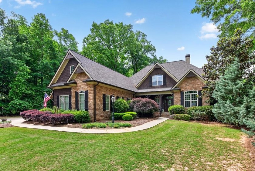 Drive up to your 4-bay garage and step into your own private - photo 4