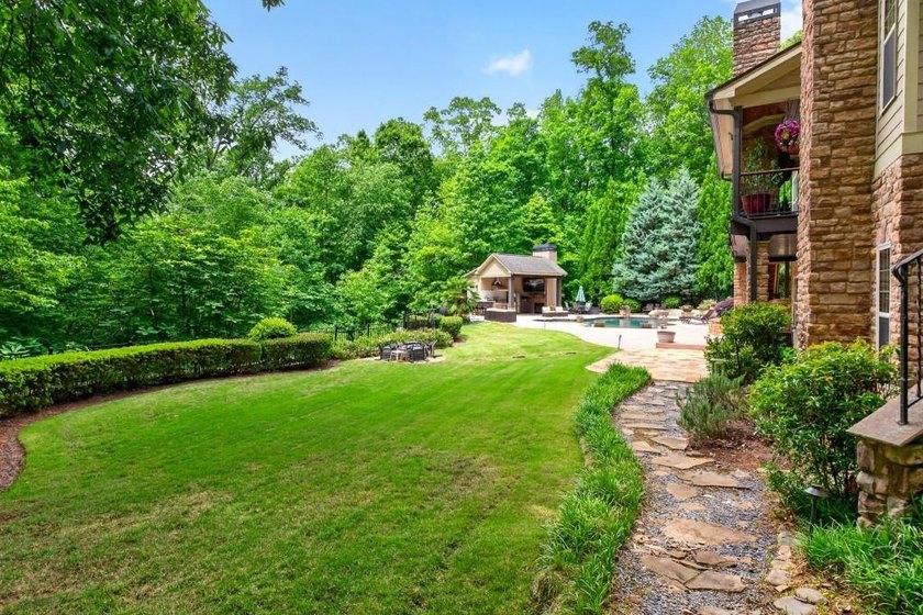 Drive up to your 4-bay garage and step into your own private - photo 9