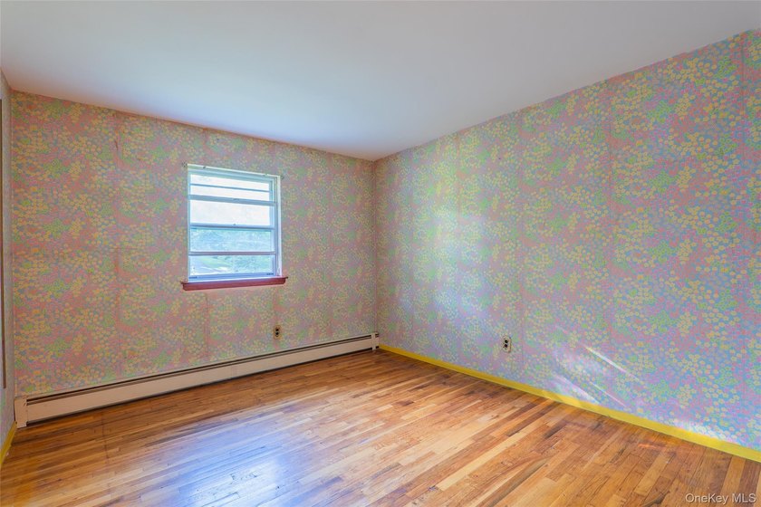 Welcome to 18 Sheryl Lane, a spacious raised ranch nestled on a - photo 16