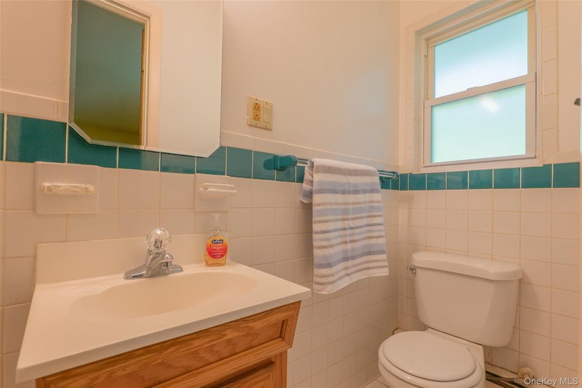 Welcome to 18 Sheryl Lane, a spacious raised ranch nestled on a - photo 22