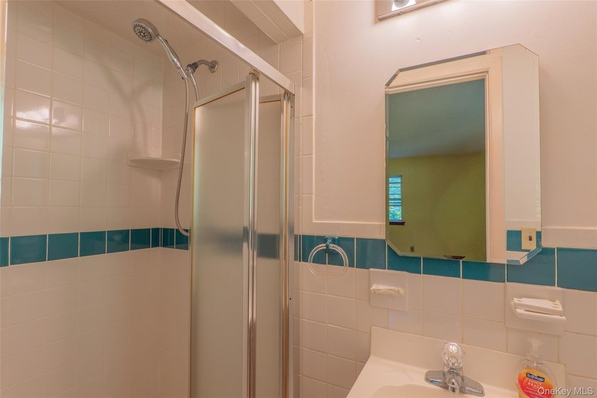 Welcome to 18 Sheryl Lane, a spacious raised ranch nestled on a - photo 23
