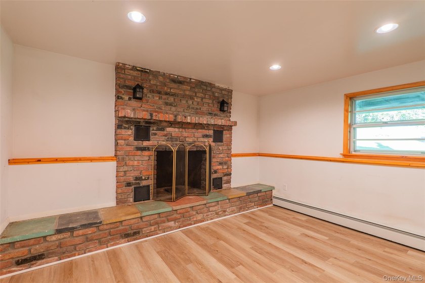Welcome to 18 Sheryl Lane, a spacious raised ranch nestled on a - photo 25