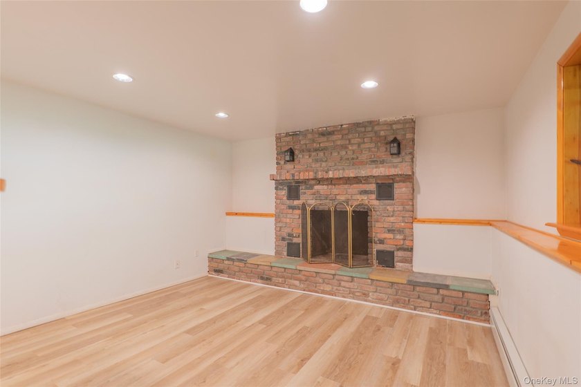 Welcome to 18 Sheryl Lane, a spacious raised ranch nestled on a - photo 26