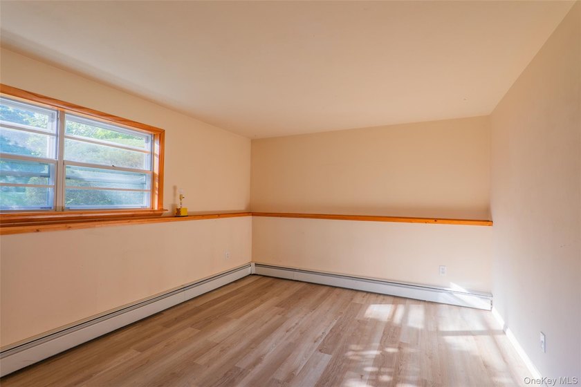 Welcome to 18 Sheryl Lane, a spacious raised ranch nestled on a - photo 27