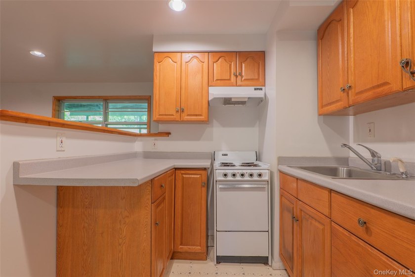 Welcome to 18 Sheryl Lane, a spacious raised ranch nestled on a - photo 30