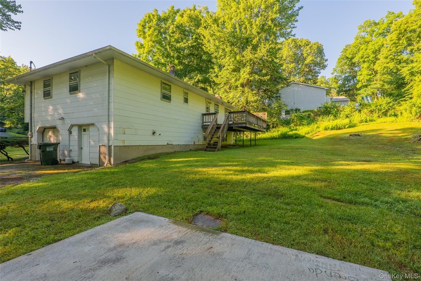 Welcome to 18 Sheryl Lane, a spacious raised ranch nestled on a - photo 37