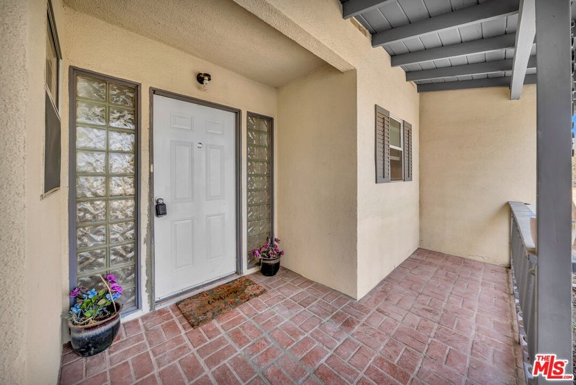 This charming single-story home blends mid-century character - photo 4