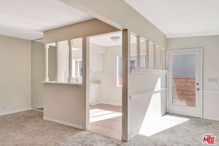 This charming single-story home blends mid-century character - photo 10