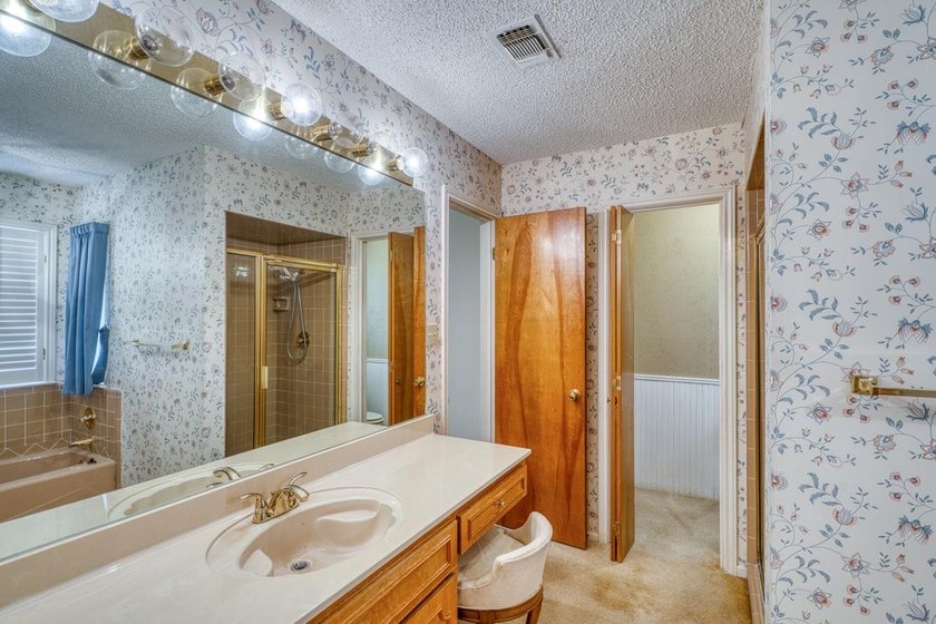 Opportunity awaits in this quaint brick home with a tile roof - photo 18