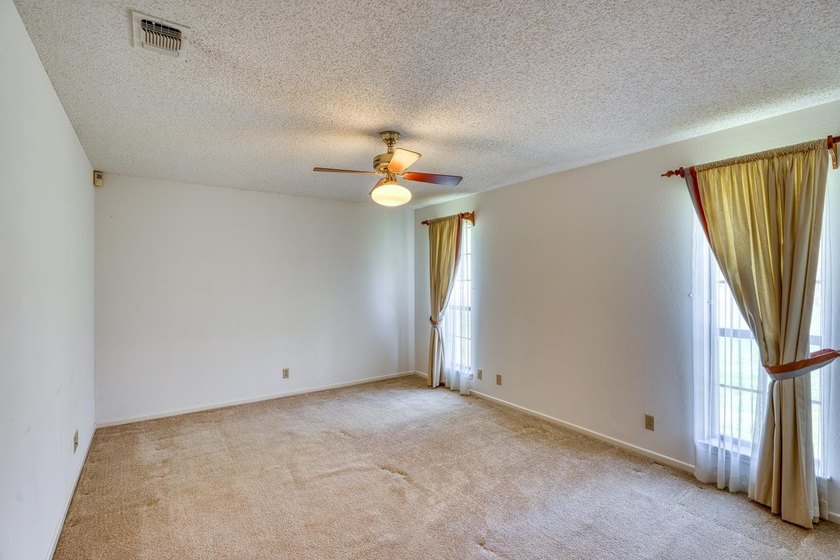 Opportunity awaits in this quaint brick home with a tile roof - photo 19